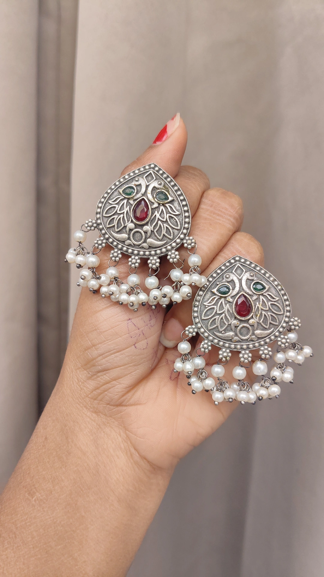 Silver lookalike stud earrings 